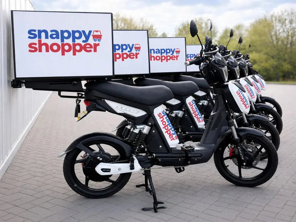A row of Eskuta SX-250s in Snappy Shopper livery ready for delivery